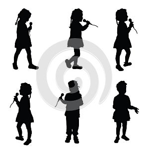 Child singing silhouette with microphone