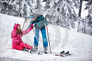 Child skiing in the mountains. Winter sport for kids. Family vac