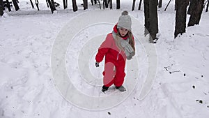 Child Sledding in Snow, Little Girl Playing in Winter, Kid Sledging in Park