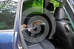 Child sleeping in the car