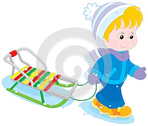 Child with a sleigh