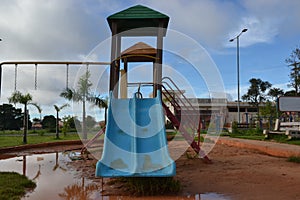 Child slide in a deserted square following the quarantine measures imposed to prevent the proliferation of the COVID-19 coronaviru