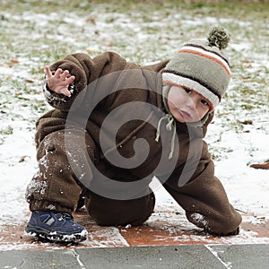 Child on slippery pavement photo