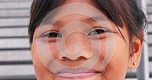 Child, smile and closeup on eyes or face for learning, education or our vision for school, scholarship or happiness