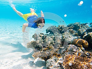 Child snorkeling. Kids underwater. Beach and sea