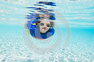 Child snorkeling. Kids underwater. Beach and sea