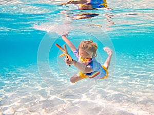 Child snorkeling. Kids underwater. Beach and sea