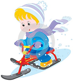 Child on a snow scooter