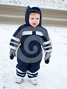 Child in snowsuit