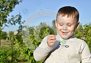 Child and soap bubbles