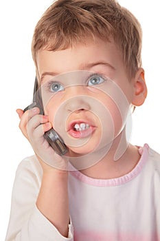 Child speaks on cell phone