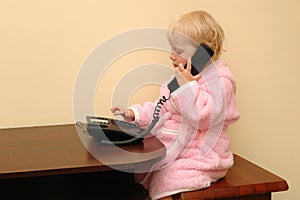 Child speaks on the phone