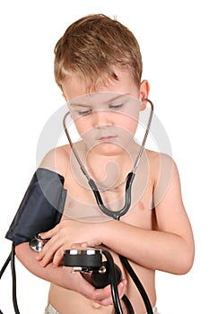 Child with sphygmomanometer