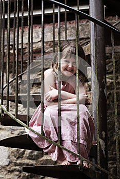 Child on spiral staircase