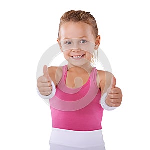 Child, sports and thumbs up in portrait, agreement vote or hand gesture for like on white background. Smile, review or