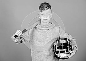 Child sportsman. Sport game. Fitness diet brings health and energy. Gym workout of teen boy. Baseball bat and helmet