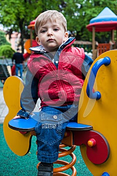 Child on a spring horse