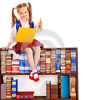 Child with stack book.