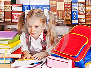 Child with stack book.