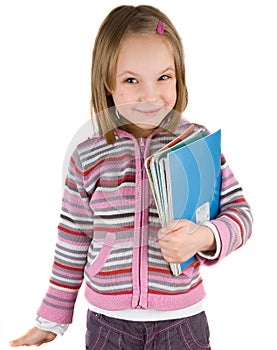 Child with a stack of notebooks