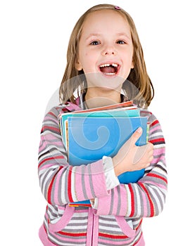 Child with a stack of notebooks