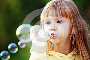 Child starting soap bubbles