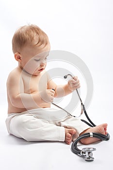 Child with stethoscope photo