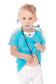 Child with stetoscope playing doctor