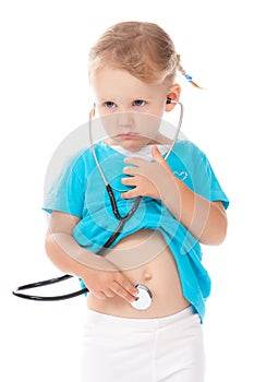 Child with stetoscope playing doctor photo