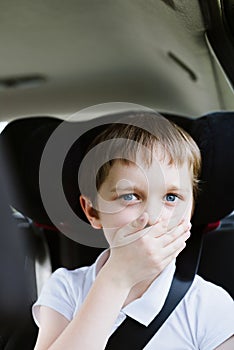 Child suffers from motion sickness in car