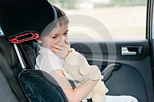 Child suffers from motion sickness in car