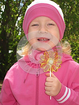 Child with a sugar candy