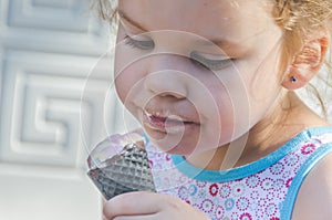 Child summer day eating ice cream