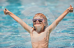 Child in summer swimming pool. Activities child on the pool, children swimming and playing in water, happiness kids and
