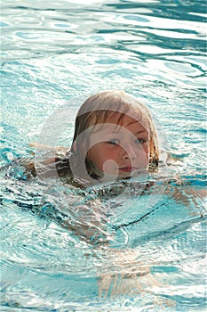 child swimming