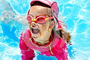 Child in swimming pool.