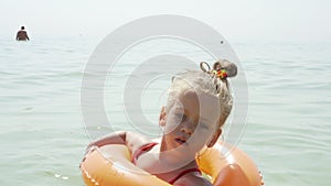 Child swims sea inflatable ring. danger of drowning Safety equipment, Child Life buoy