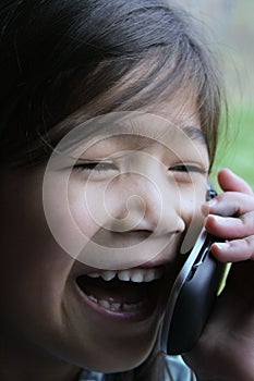 Child talking on cell phone