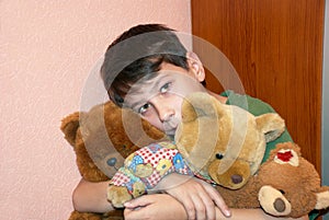 Child with teddy bears