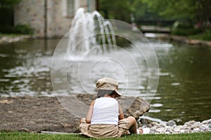 Child throwing rocks