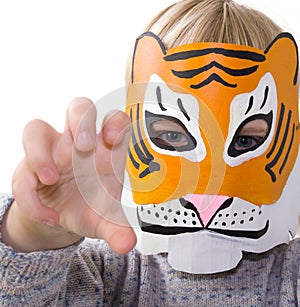 Child tiger mask pretending photo