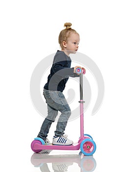 Child toddler girl learning to ride and balance on push three Wheel Adjustable Height Scooter