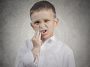 Child with toothache photo