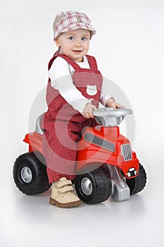 Child and toy - car