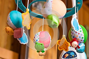 Child toy musical mobile air balloons with animals peeking out