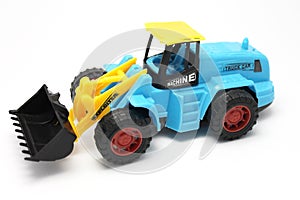 Child toy, tractor, on white background