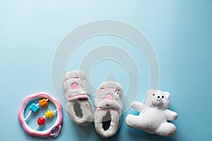 Child toys on blue background. baby flat lay with copy space