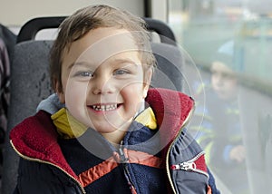 Child traveling by bus