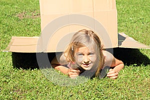 Child under the box