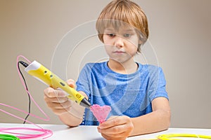 Child using 3D printing pen. Creative, technology, leisure, education concept
